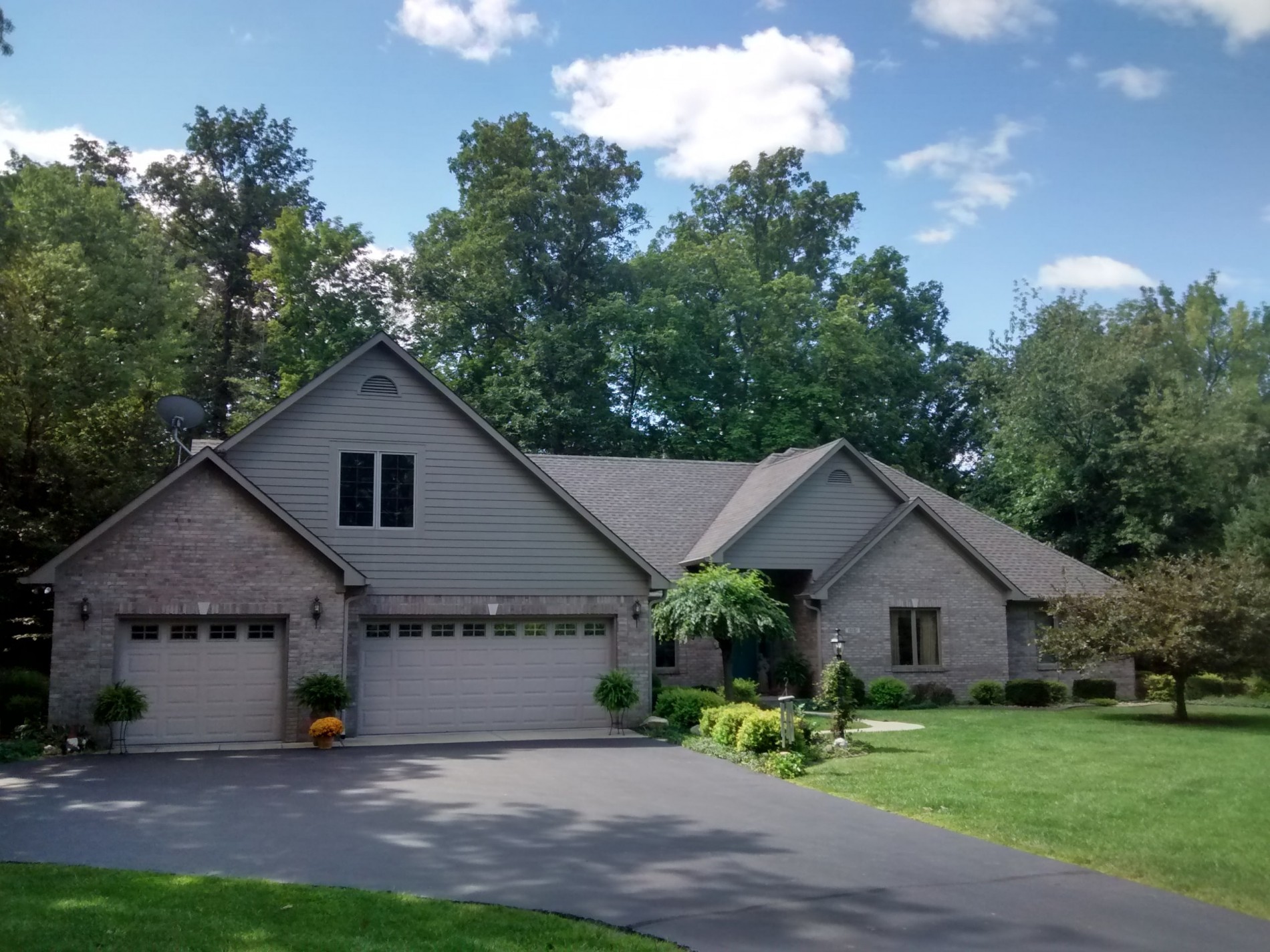 Home siding installation, beautiful home restoration, roofing, gutters and remodeling by Finney and Sons Construction